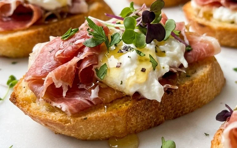 Beef Prosciutto Crostini with Burrata and Lemon Honey Drizzle